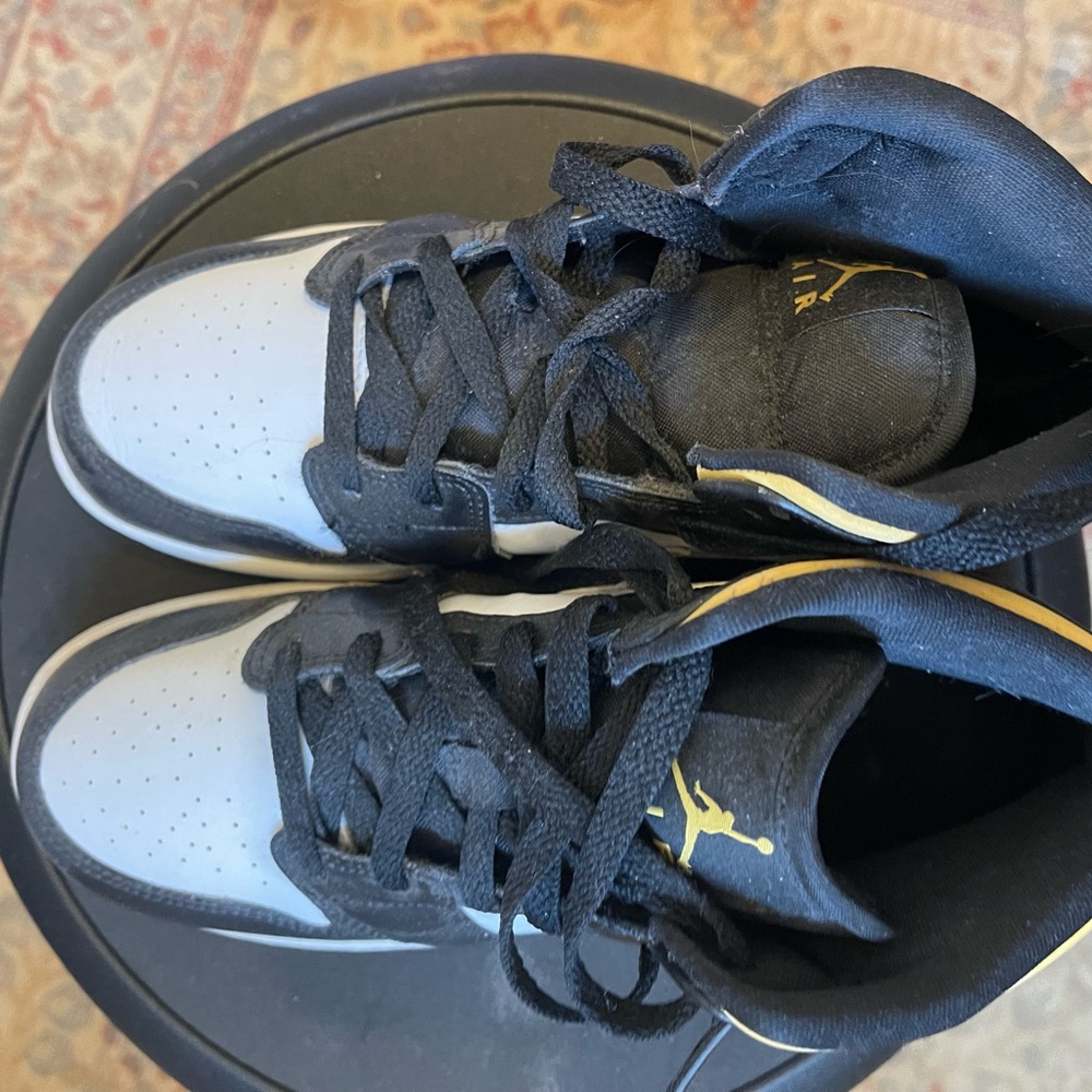Air Jordan Black and Gold Sneakers